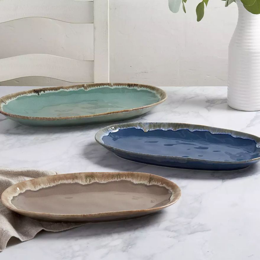 Various empty trays of different colors