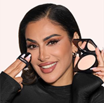 Image of model applying powder.