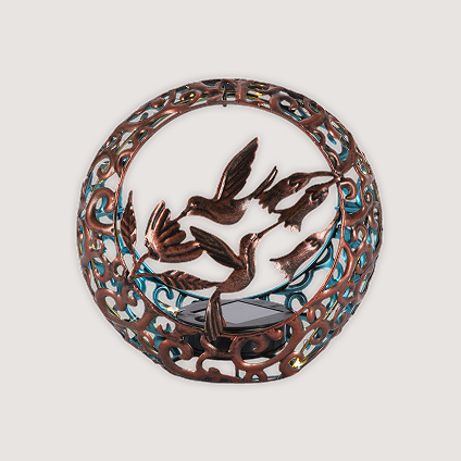 Decorative accent featuring depictions of hummingbirds.