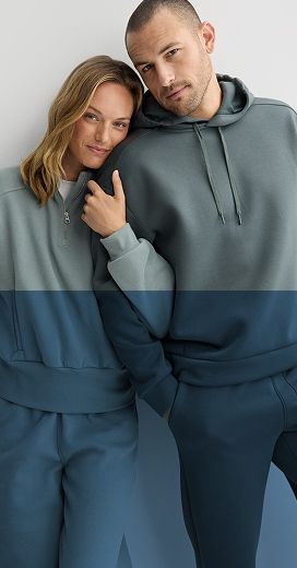 man and woman wearing flx sports attire