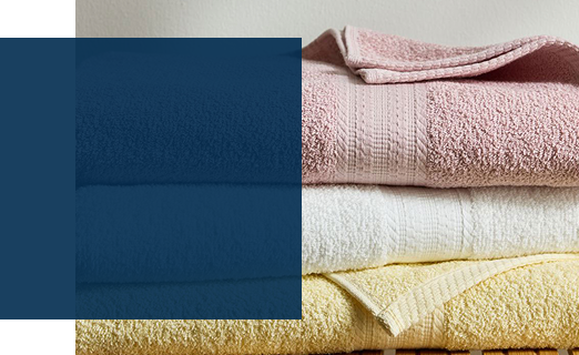 a stack of different colored towels