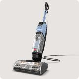 Vacuum over a gray background.
