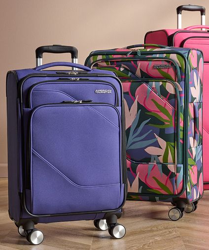 Three American Tourister baggage peices - purple, pink, and multicolored.