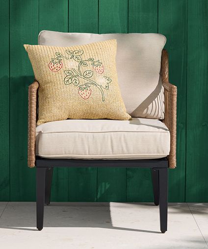 Neutral colored picture frames and home decor arrangement.