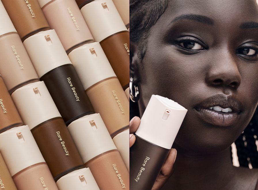 6 rows of Rare Beauty foundation containers stacked on top of eachother along with an a model holding one bottle up to her face.