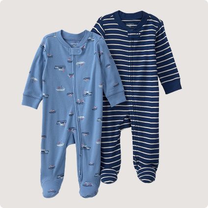 Two blue patterned baby zip-up sleepers