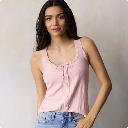 Woman in light pink ribbed tank