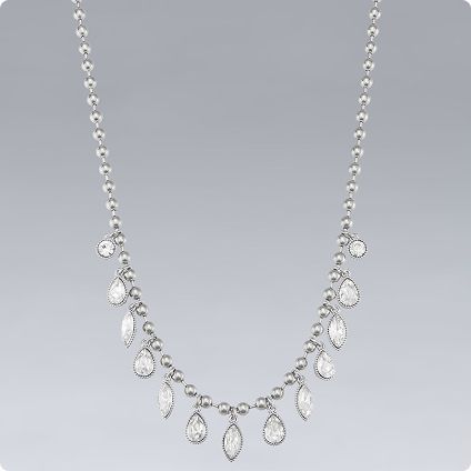 Silver necklace with clear teardrop pendants