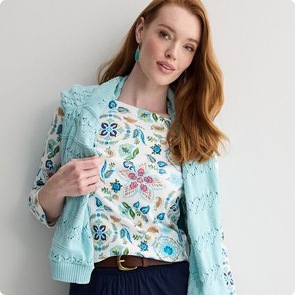 Woman wearing floral top and cardigan