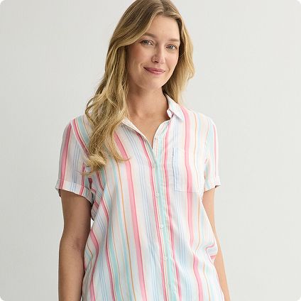 Woman wearing pink striped collared shirt