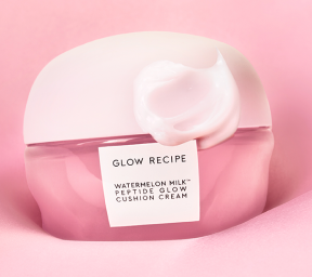 Glow Recipe Watermelon Milk peptide glow cushion cream on a pink background.