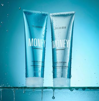 Two bottles of COLOR WOW Money Laundering Shampoo over a blue background.