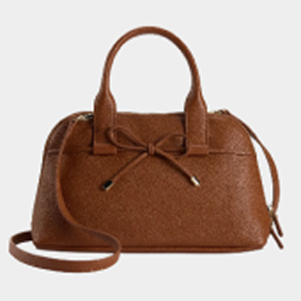Brown handbag over a gray background.