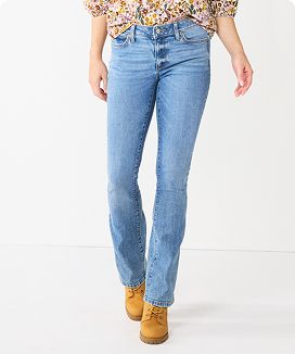 Woman wearing bootcut jeans