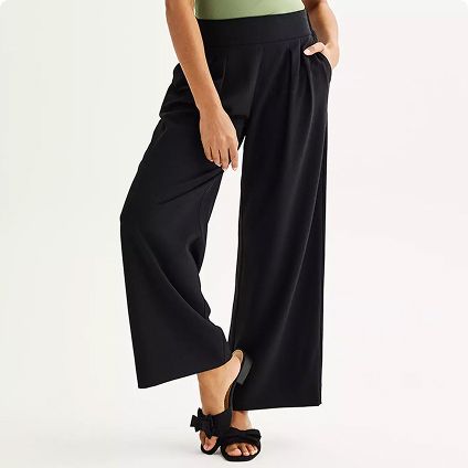 Woman wearing wide-leg trousers