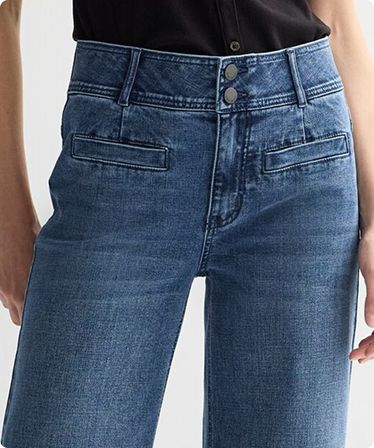 Close-up of a woman wearing high-rise jeans