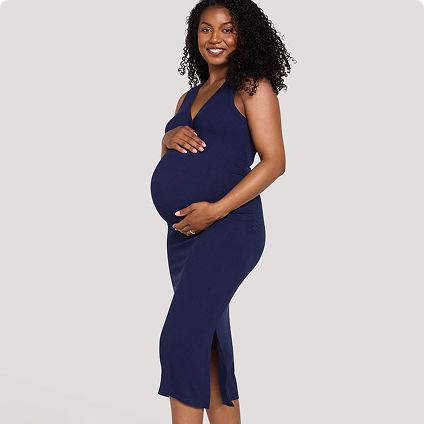 Pregnant woman wearing maternity clothing