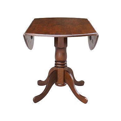 International Concepts Round Dual Drop Leaf Pedestal Table