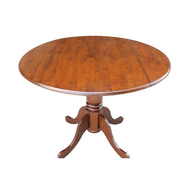 International Concepts Round Dual Drop Leaf Pedestal Table