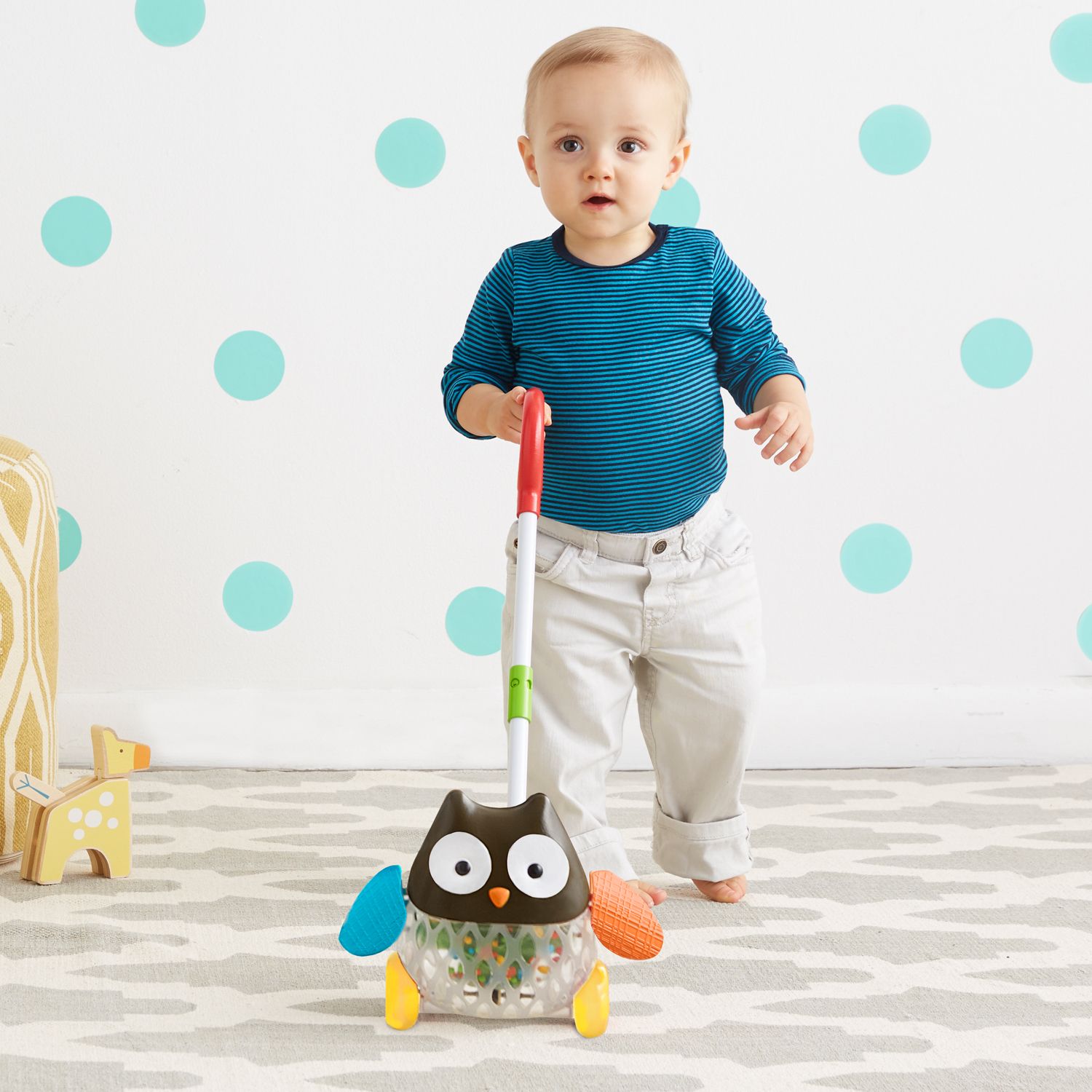 skip hop explore and more rolling owl push toy