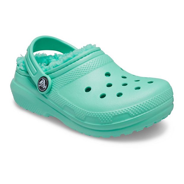 Teal on sale fur crocs