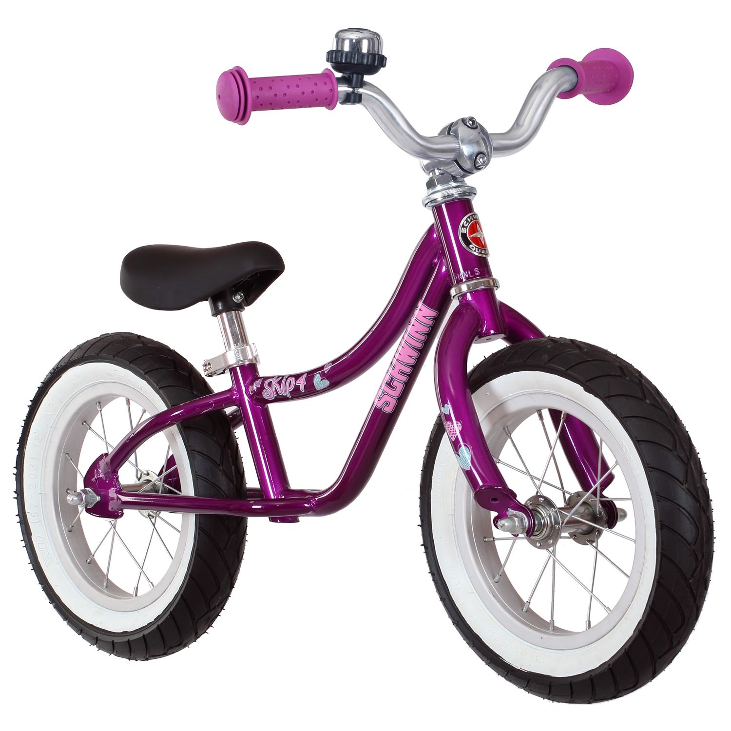 pink balance bike with basket