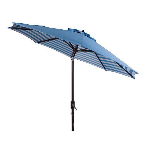 striped patio umbrella with lights