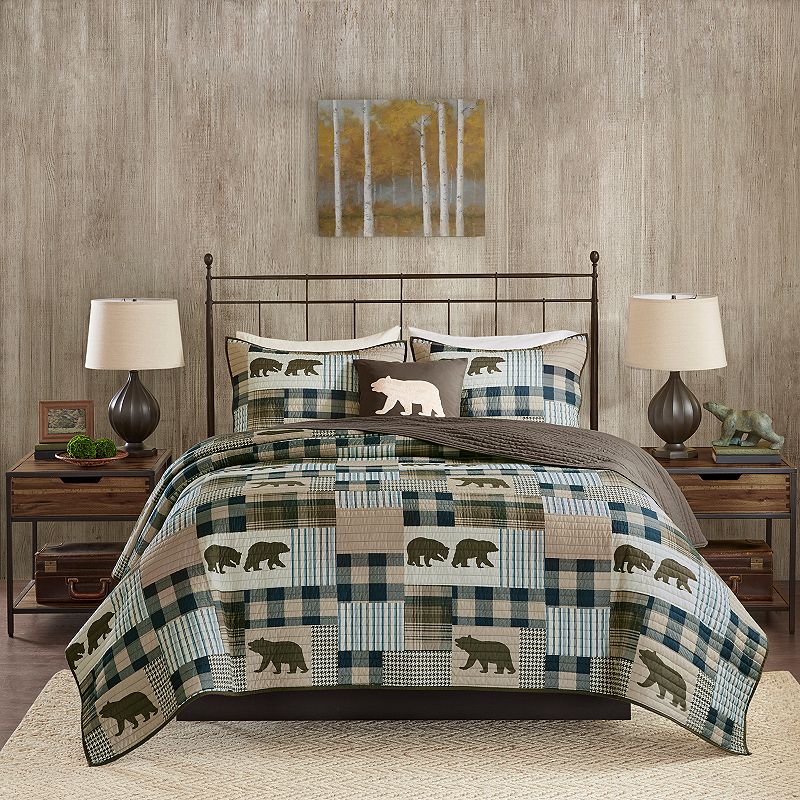 Woolrich Twin Falls Oversized 4-piece Quilt Set, Brown, King This Woolrich Twin Falls quilt set offers a fresh and handsome look for your space. FEATURES Plaid prints & a bear motif Solid reverse complements the top of the bed Channel quilting Oversized for full coverage Coordinating shams & throw pillow complete the look FULL/QUEEN 4-PIECE SET Quilt: 92'' x 96'' Two shams: 20'' x 26'' (each) Throw pillow: 18'' x 18'' KING/CAL. KING 4-PIECE SET Quilt: 110'' x 96'' Two shams: 20'' x 36'' (each) Throw pillow: 18'' x 18'' CONSTRUCTION AND CARE Polyester Machine wash Imported Promotional offers available online at Kohls.com may vary from those offered in Kohls stores. Color: Brown. Gender: unisex. Age Group: adult.