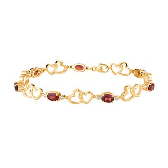 LOVEABLES 10k Gold Garnet & 1/6 Carat T.W. Diamond Double Heart Link Bracelet