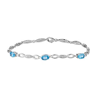 10k White Gold Swiss Blue Topaz & 1/10 Carat T.W. Diamond Bracelet
