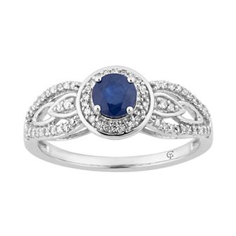 10k White Gold Sapphire & 1/4 Carat T.W. Diamond Halo Ring