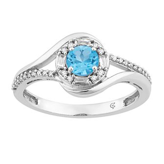 10k White Gold Swiss Blue Topaz & 1/5 Carat T.W. Diamond Halo Ring