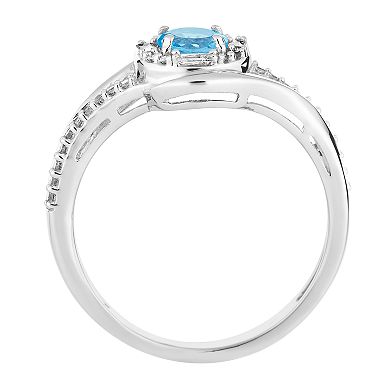 LOVEABLES 10k White Gold Swiss Blue Topaz & 1/5 Carat T.W. Diamond Halo Ring