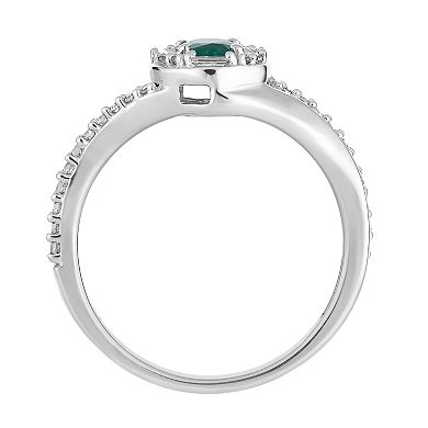10k White Gold Emerald & 1/4 Carat T.W. Diamond Oval Halo Ring