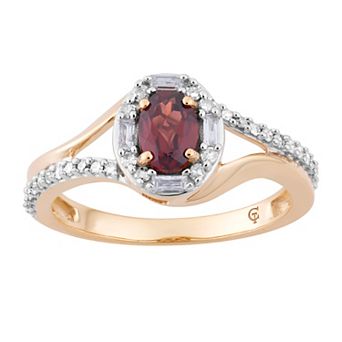 LOVEABLES 10k Gold Garnet & 1/4 Carat T.W. Diamond Oval Halo Ring