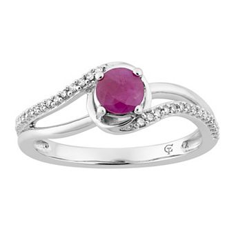 LOVEABLES 10k White Gold Ruby & 1/8 Carat T.W. Diamond Swirl Ring