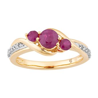 LOVEABLES 10k Gold Ruby & 1/10 Carat T.W. Diamond 3-Stone Ring