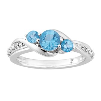10k White Gold Swiss Blue Topaz & 1/10 Carat T.W. Diamond 3-Stone Ring