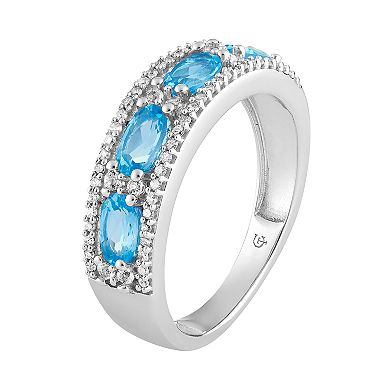LOVEABLES 10k White Gold Swiss Blue Topaz & 1/6 Carat T.W. Diamond Ring