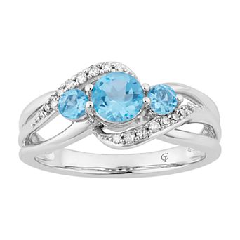 LOVEABLES 10k White Gold Swiss Blue Topaz & 1/5 Carat T.W. Diamond 3-Stone Ring