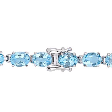 Stella Grace Sterling Silver Blue Topaz Tennis Bracelet