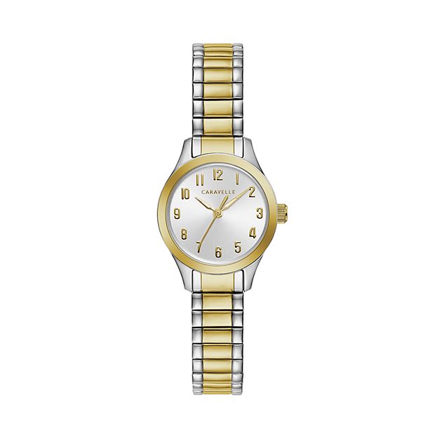 Caravelle by Bulova. White face with gold accents. top Calendar on face. Sold as is