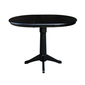 International Concepts Round Top Pedestal Table With Leaf