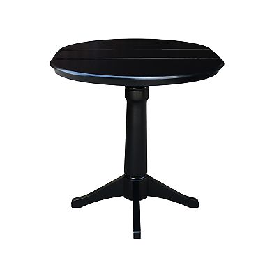 International Concepts Round Top Pedestal Table With Leaf