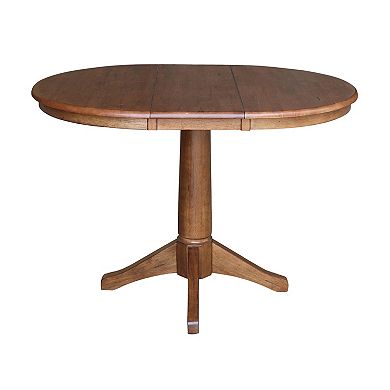 International Concepts Round Pedestal Dining Table