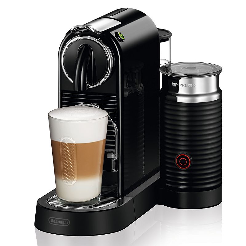 Sold at Auction: A DeLonghi Nespresso Coffee Machine & Milk