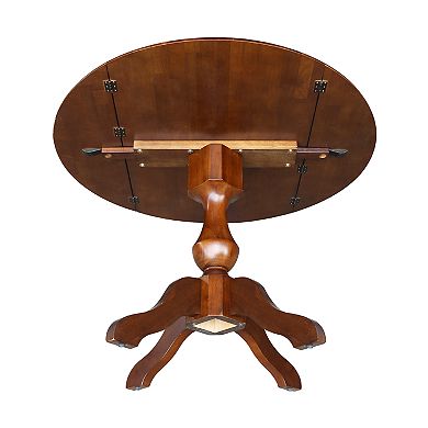 International Concepts Round Dual Drop Leaf Pedestal Dining Table