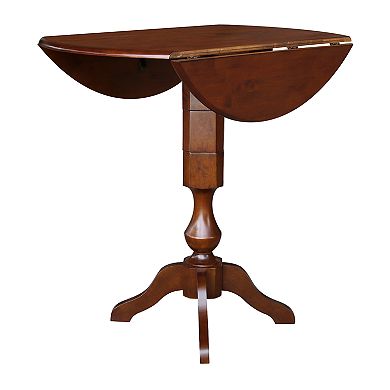 International Concepts Round Dual Drop Leaf Pedestal Dining Table