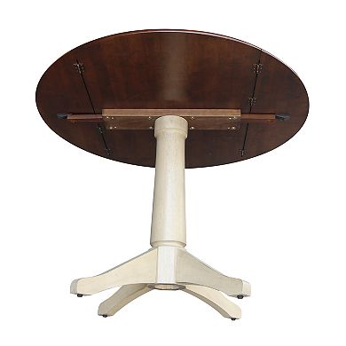 International Concepts Round Dual Drop Leaf Pedestal Table