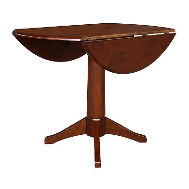 International Concepts Round Dual Drop Leaf Pedestal Table